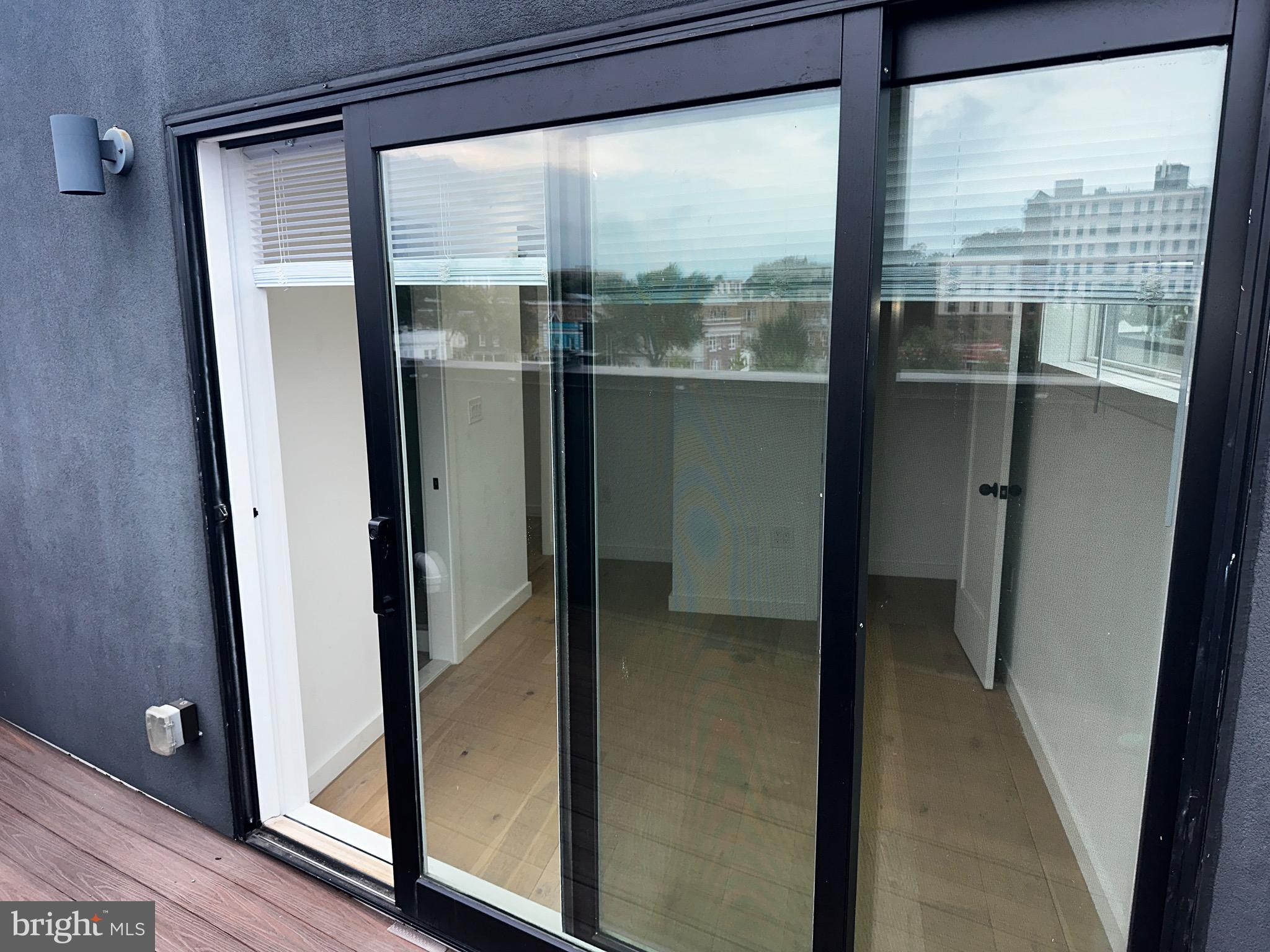 3601 14th Street Northwest Washington, DC 20010 - Photo 26 of 31 a view of a glass door and the balcony