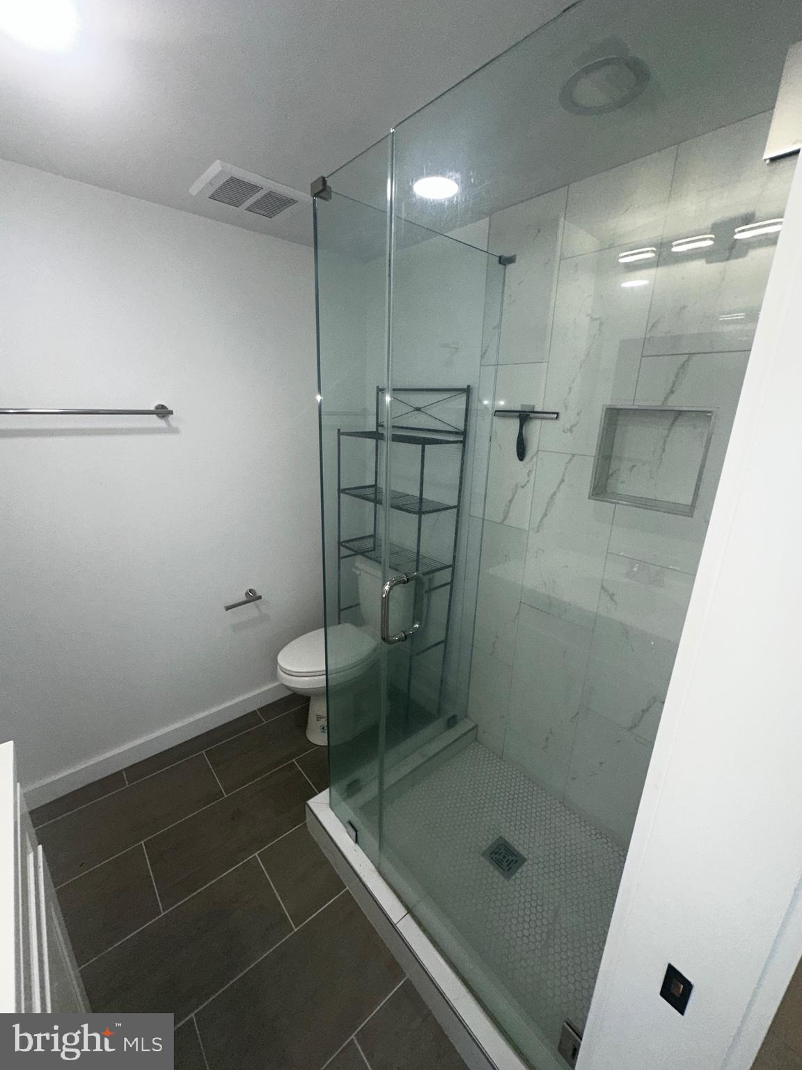 3601 14th Street Northwest Washington, DC 20010 - Photo 28 of 31 a bathroom with a shower and a toilet