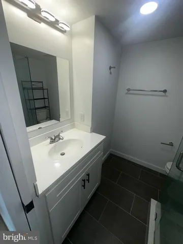 a outdoor space with lots of trees in the background