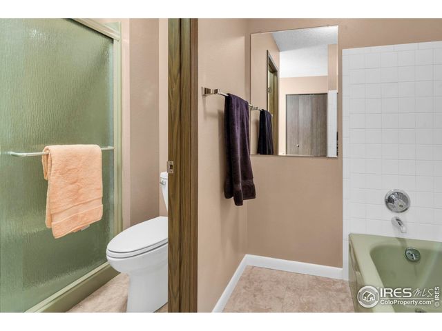 a bathroom with a toilet and a sink