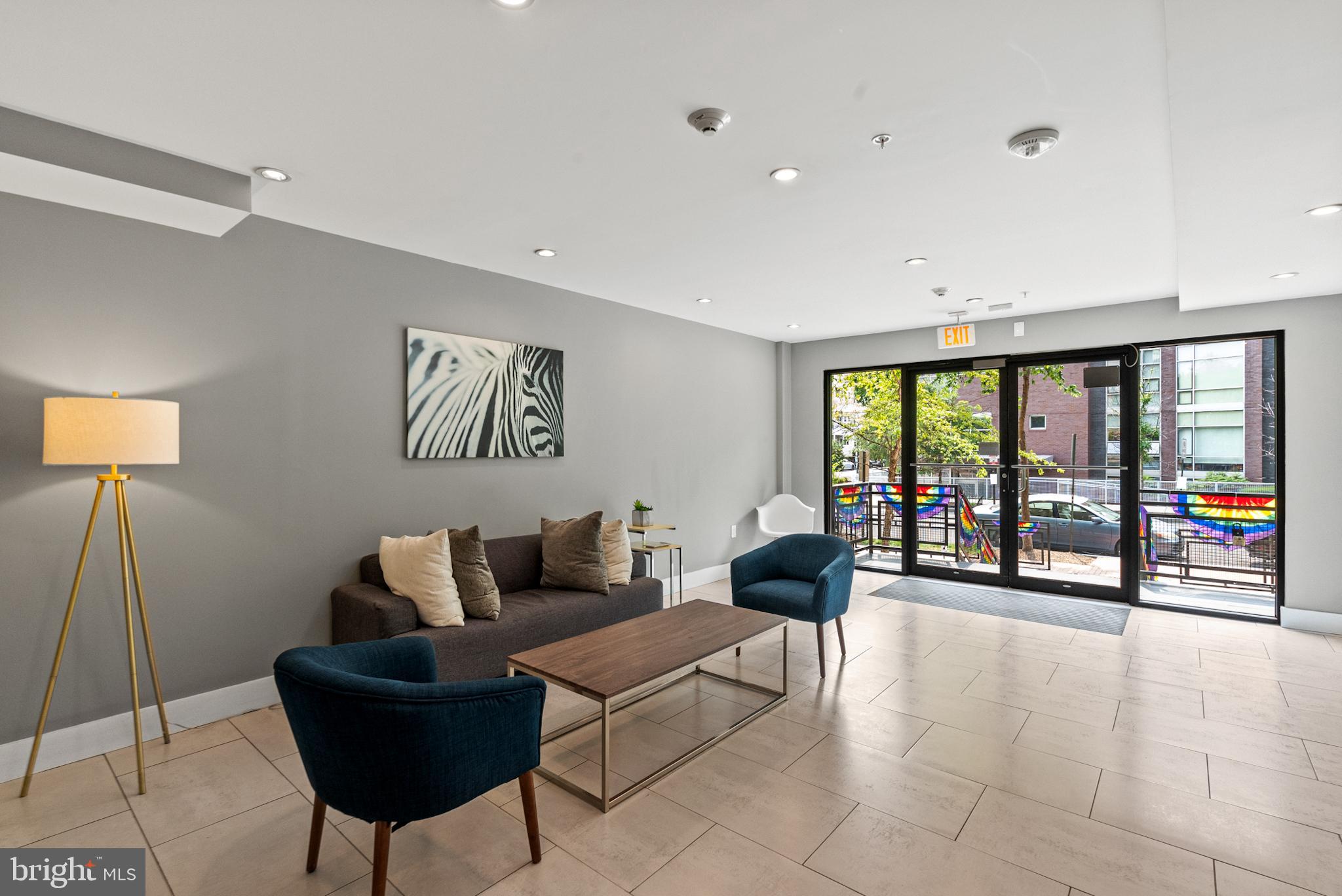 2101 11th Street Northwest, Unit 302 Washington, DC 20001 - Photo 22 of 26 a living room with furniture and a large window