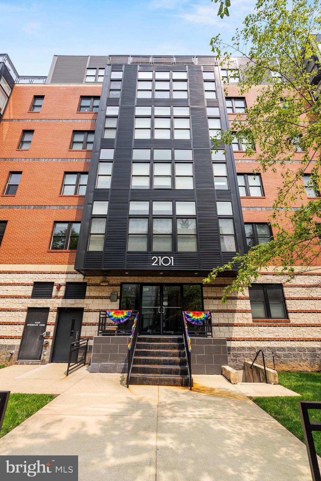 2101 11th Street Northwest, Unit 302 Washington, DC 20001 - Photo 24 of 26 a front view of a building with street