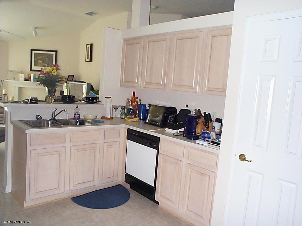 4316 Rye Jacksonville, FL 32259 - Photo 3 of 3 a kitchen with white cabinets and sink