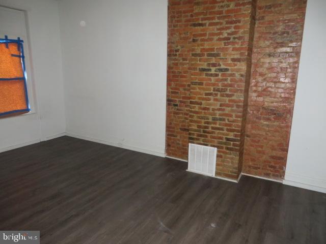 823 Hutton Street Philadelphia, PA 19104 - Photo 2 of 11 a view of an empty room with wooden floor