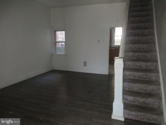 823 Hutton Street Philadelphia, PA 19104 - Photo 4 of 11 an empty room with wooden floor windows and closet
