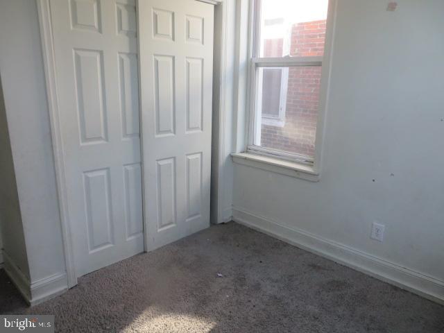 823 Hutton Street Philadelphia, PA 19104 - Photo 10 of 11 a view of an empty room with wooden floor