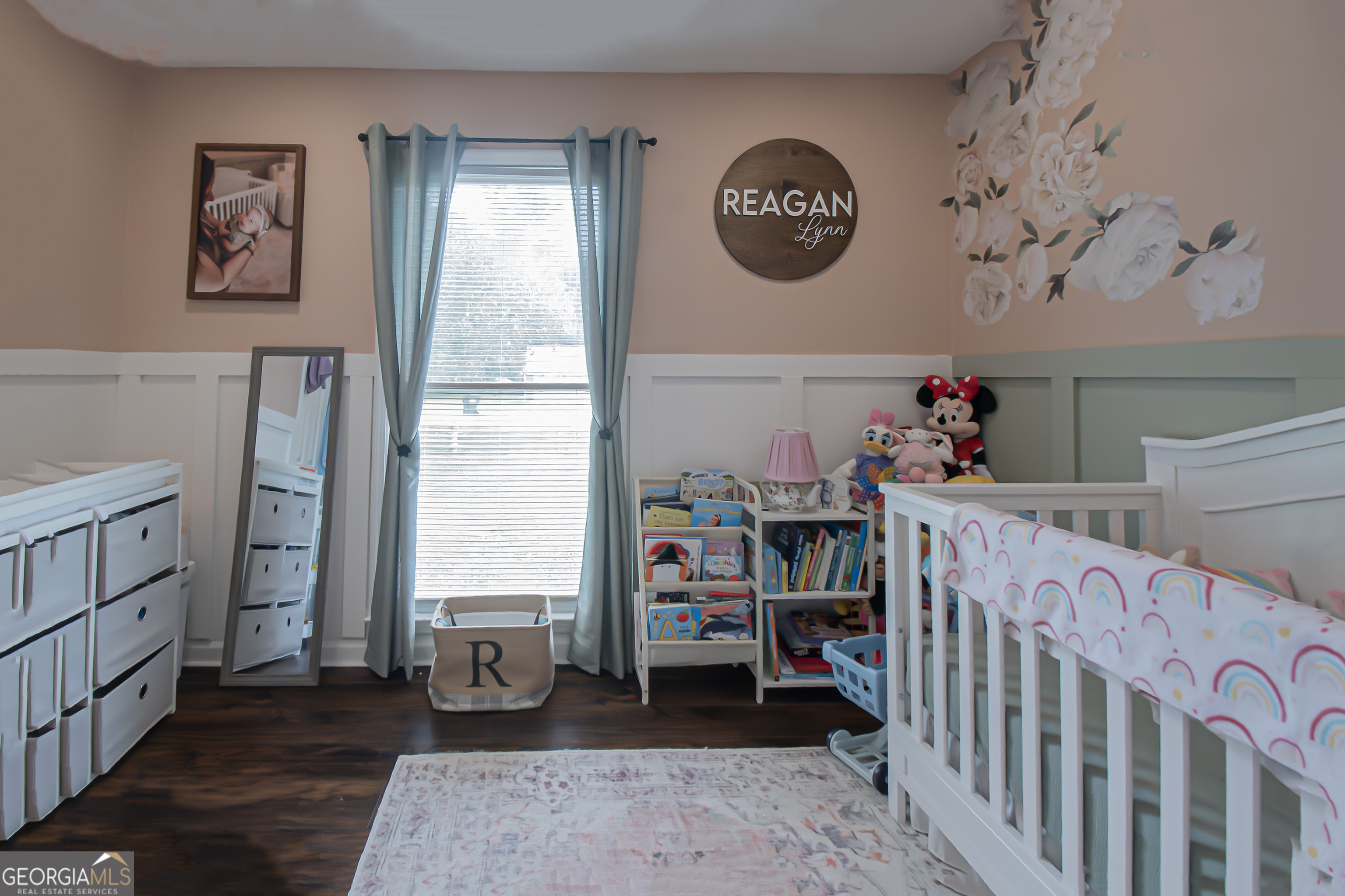 225 Graystone Drive Covington, GA 30014 - Photo 17 of 23 a bedroom with baby crib and a window