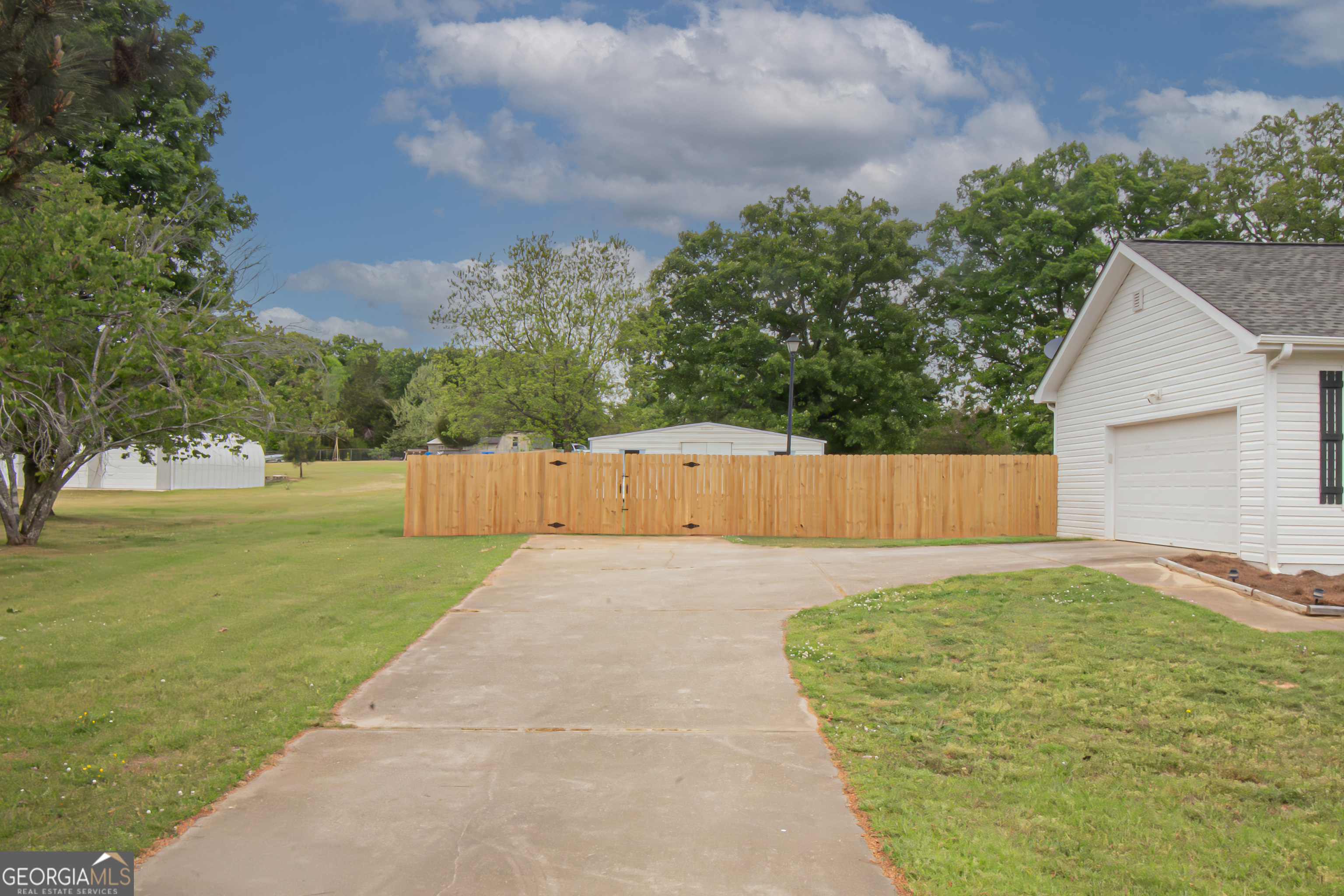 225 Graystone Drive Covington, GA 30014 - Photo 23 of 23 a view of backyard with green space