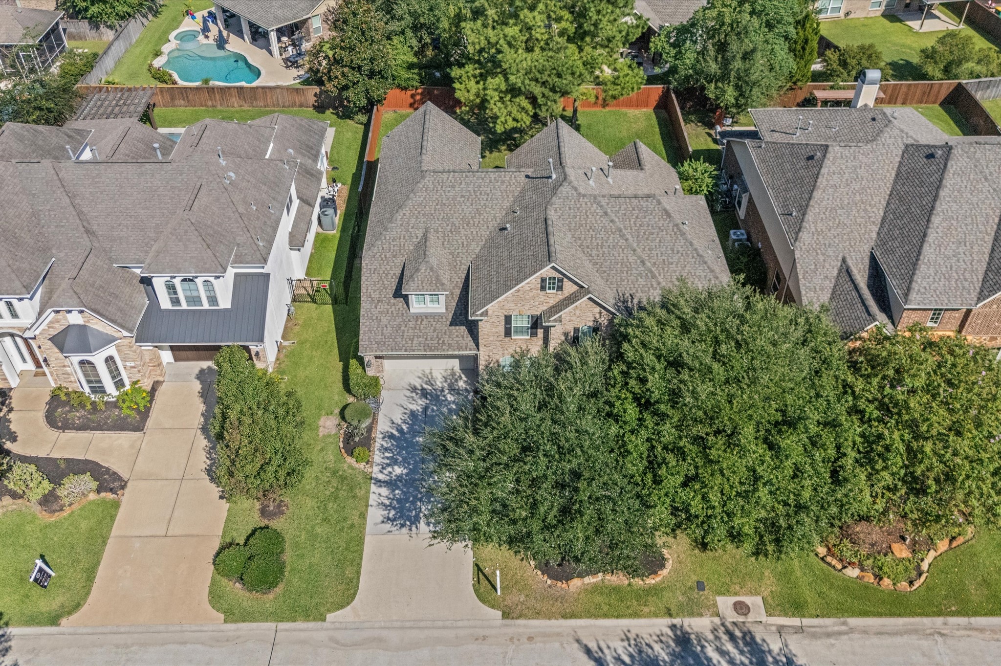 7 North Beech Springs Circle Spring, TX 77389 - Photo 50 of 50 an aerial view of a house with garden space and a street view