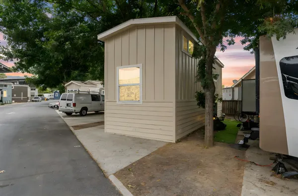 a house view with a backyard space