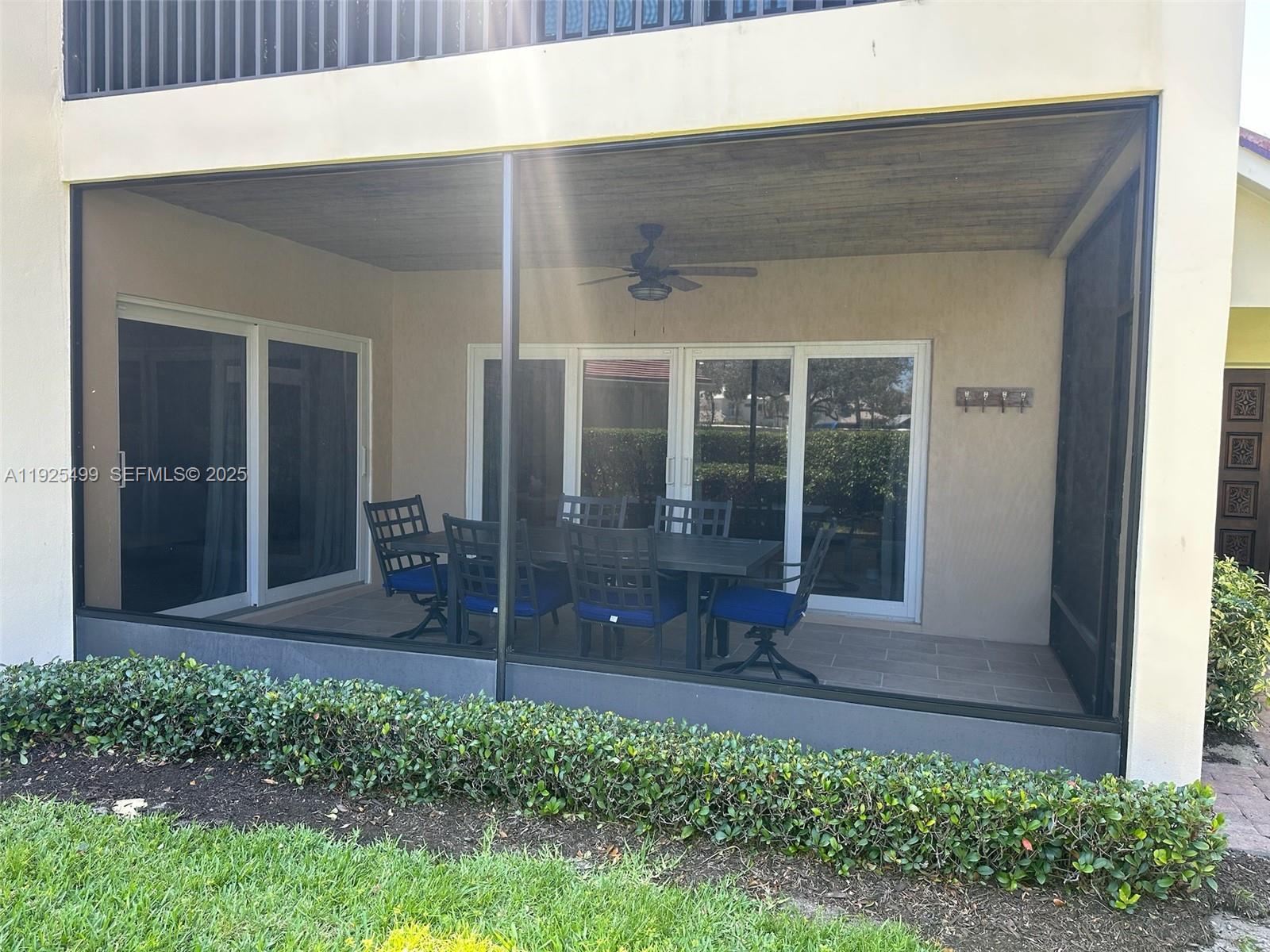 4161 South Us Highway, Unit G2 Jupiter, FL 33477 - Photo 13 of 62 a front view of a house with a yard