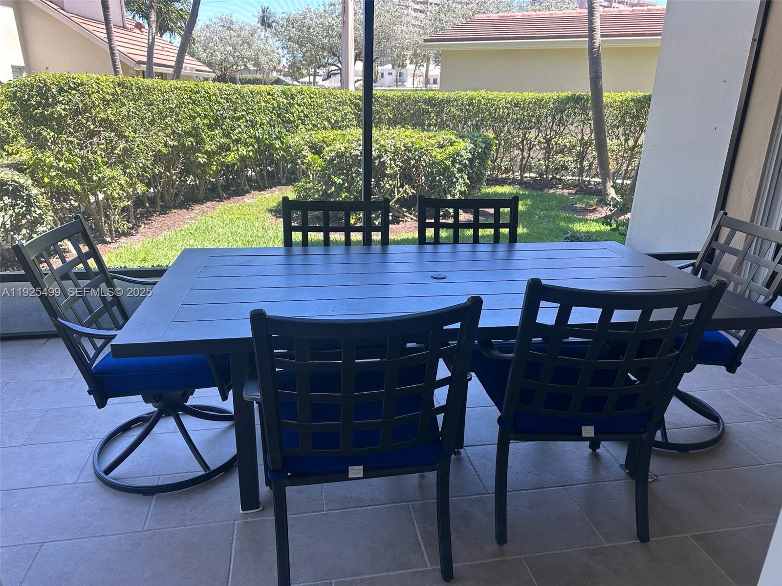 4161 South Us Highway, Unit G2 Jupiter, FL 33477 - Photo 34 of 62 a view of a dining room with furniture window and outside view