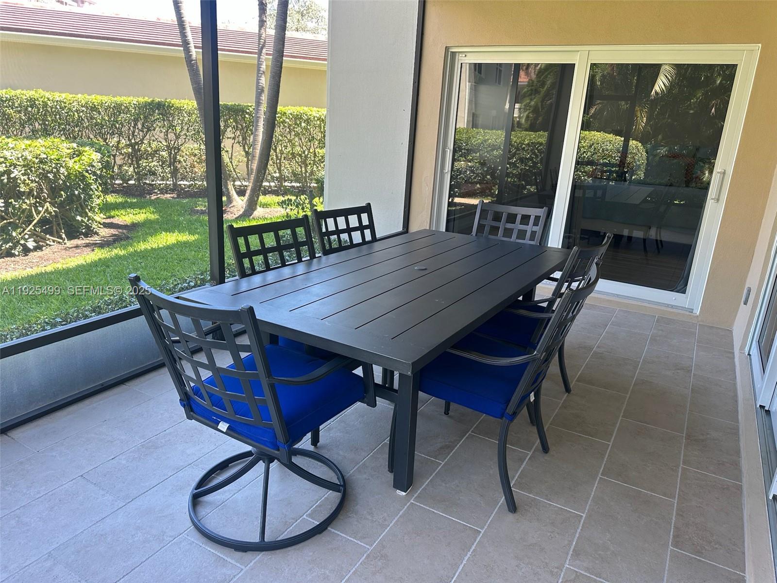 4161 South Us Highway, Unit G2 Jupiter, FL 33477 - Photo 35 of 62 a view of a dining room with furniture window and outside view