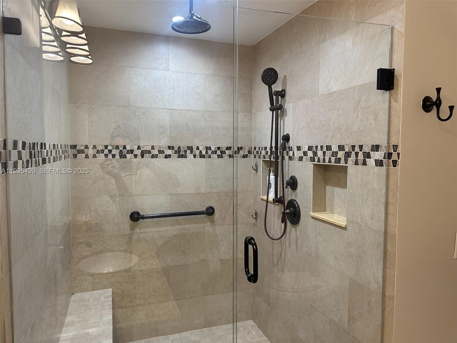 4161 South Us Highway, Unit G2 Jupiter, FL 33477 - Photo 46 of 62 a bathroom with a shower