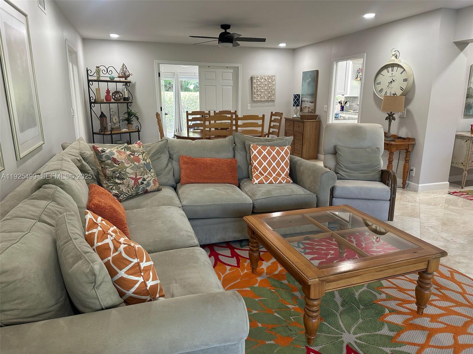 4161 South Us Highway, Unit G2 Jupiter, FL 33477 - Photo 49 of 62 a living room with furniture and wooden floor