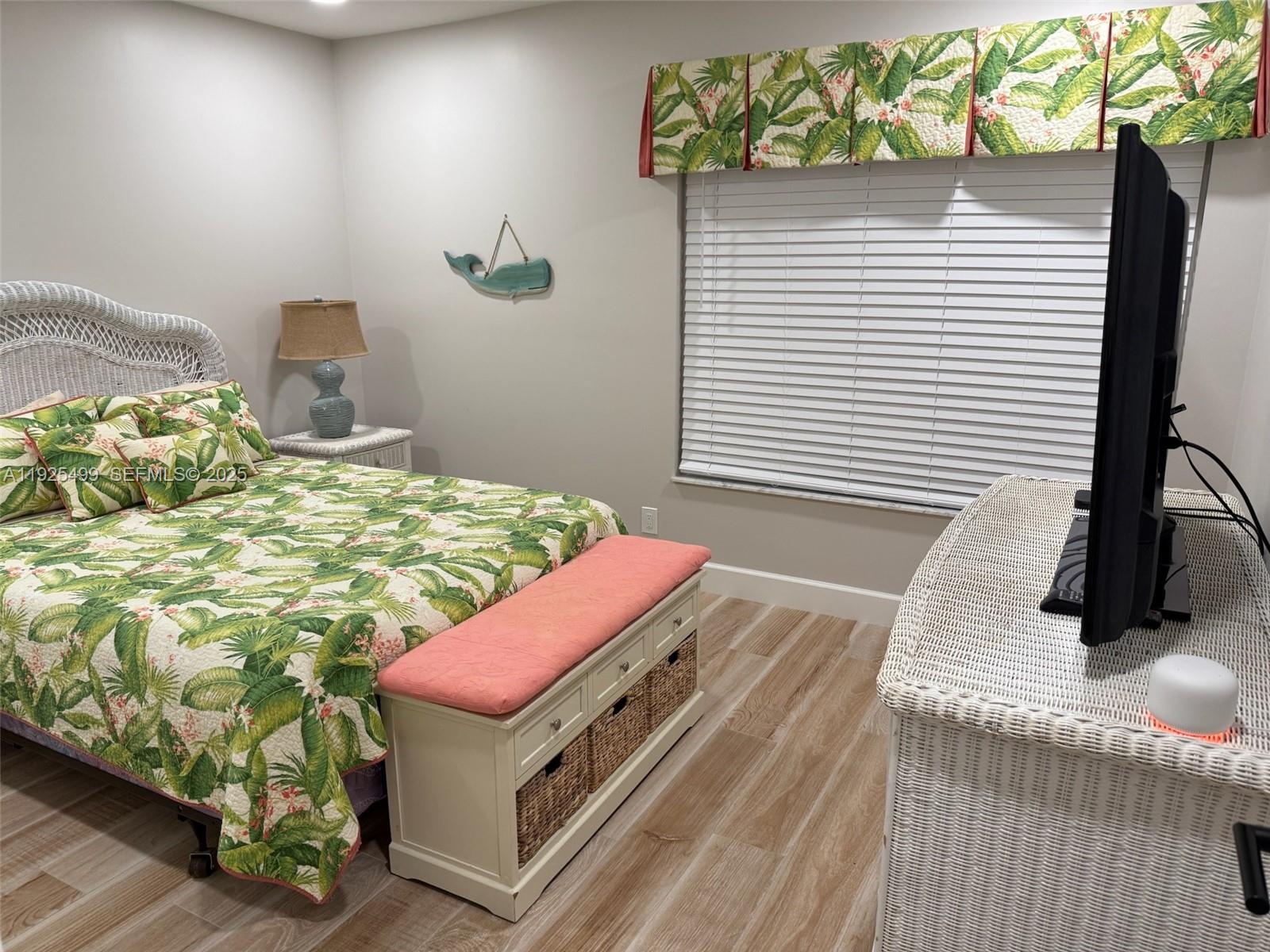 4161 South Us Highway, Unit G2 Jupiter, FL 33477 - Photo 51 of 62 a bedroom with a bed and a window