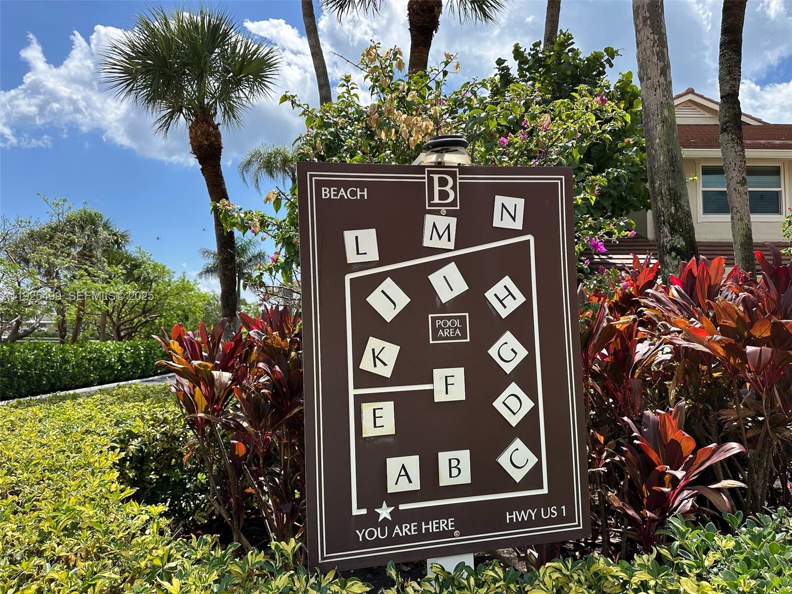 4161 South Us Highway, Unit G2 Jupiter, FL 33477 - Photo 6 of 62 a sign that is on a pole