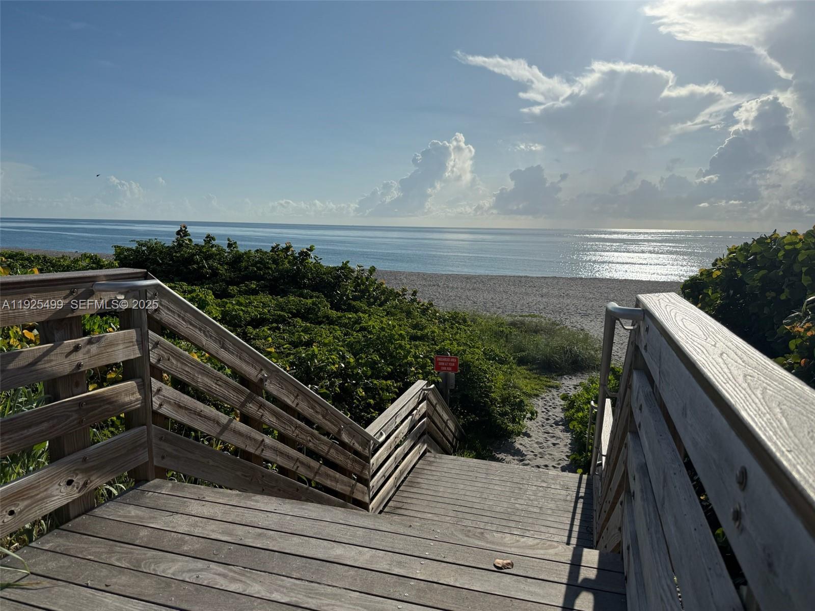 4161 South Us Highway, Unit G2 Jupiter, FL 33477 - Photo 61 of 62 a view of outdoor space with wooden floor and lake view