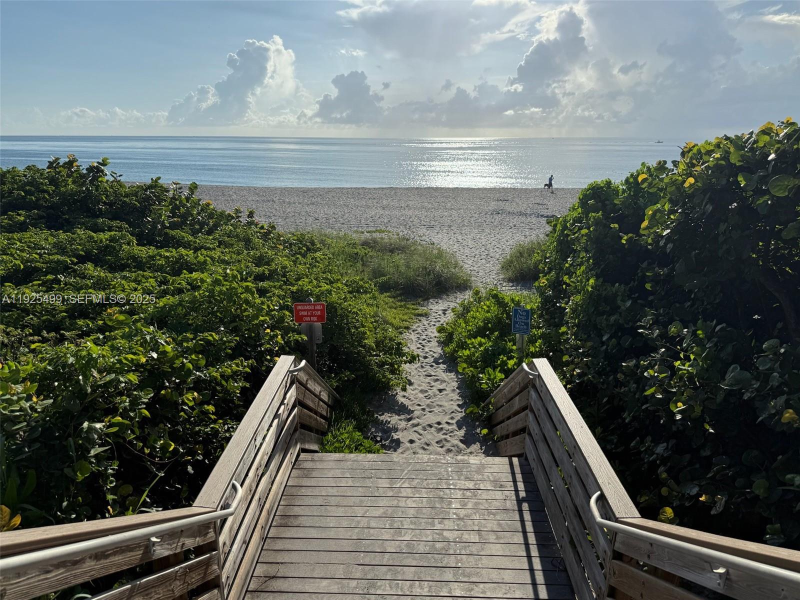 4161 South Us Highway, Unit G2 Jupiter, FL 33477 - Photo 62 of 62 a view of balcony with wooden floor and fence