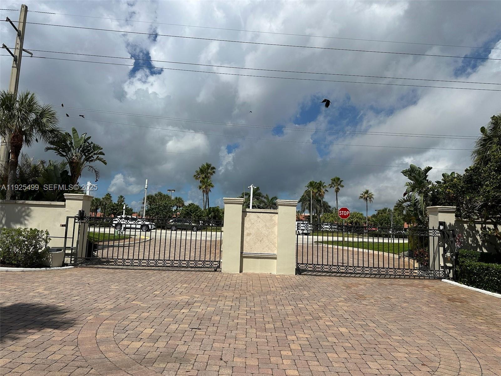 4161 South Us Highway, Unit G2 Jupiter, FL 33477 - Photo 7 of 62 a view of a wrought iron fences in front of house