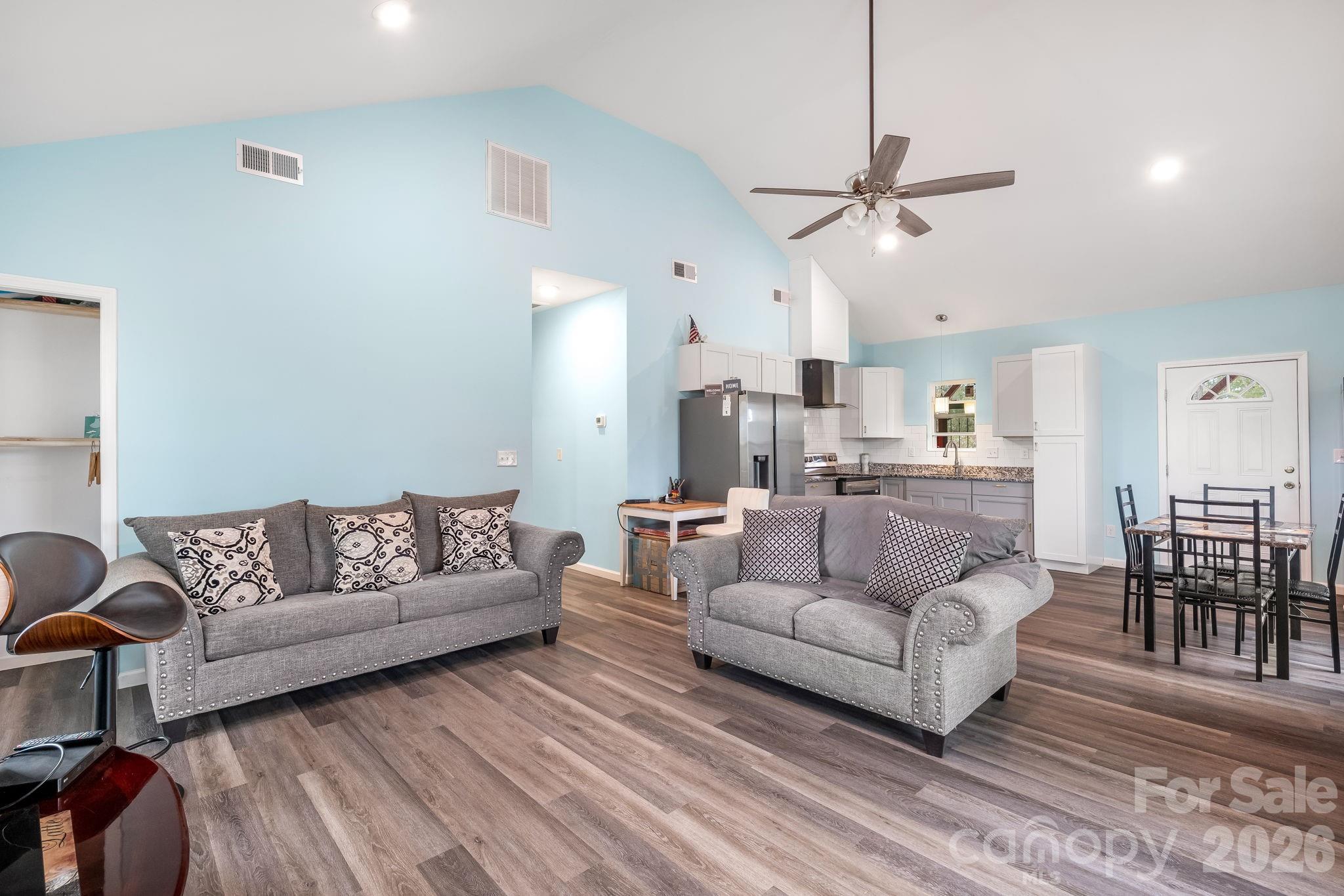 845 Spindale Street Spindale, NC 28160 - Photo 5 of 27 a living room with furniture and kitchen view
