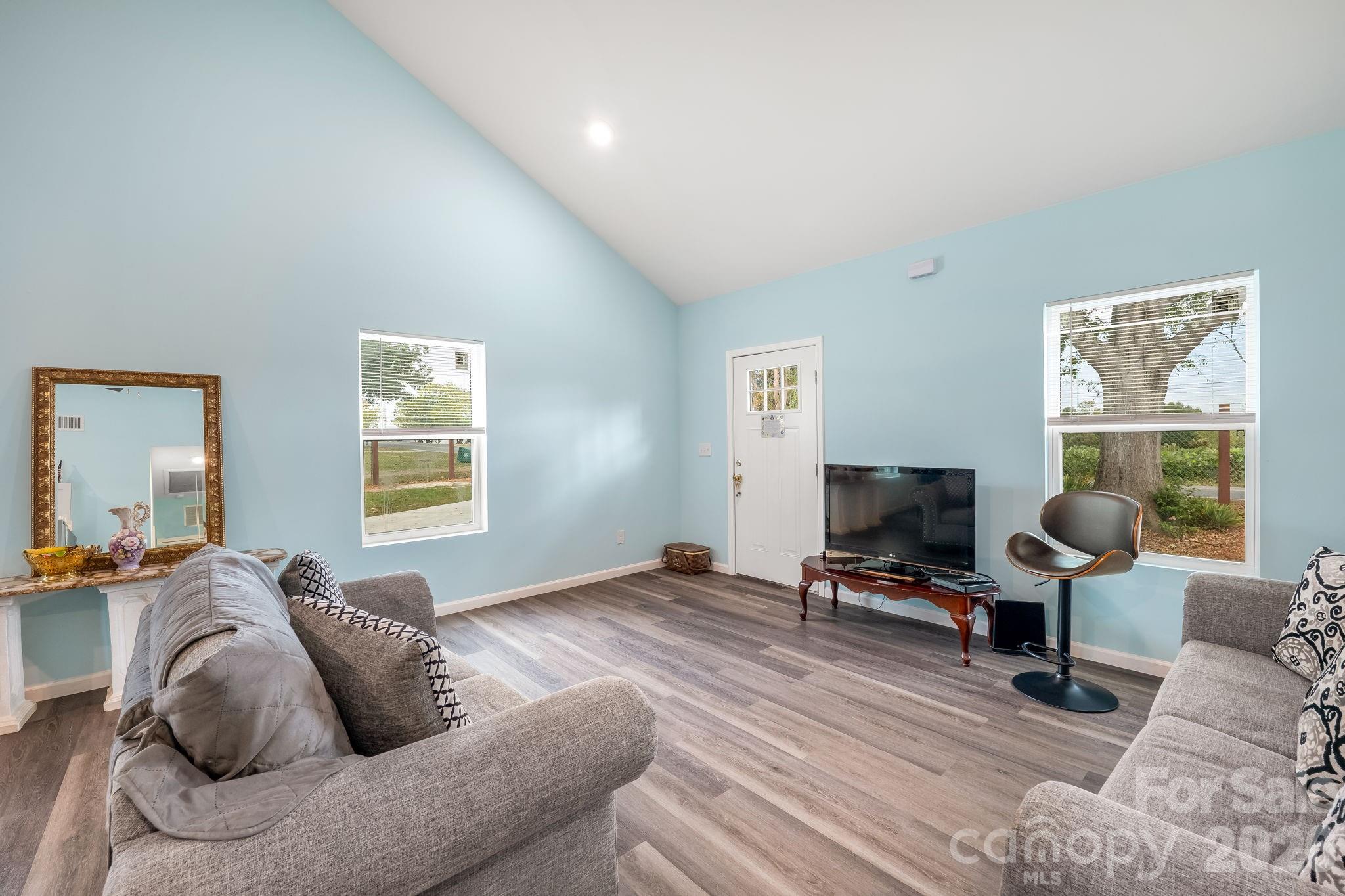 845 Spindale Street Spindale, NC 28160 - Photo 6 of 27 a living room with furniture and a window