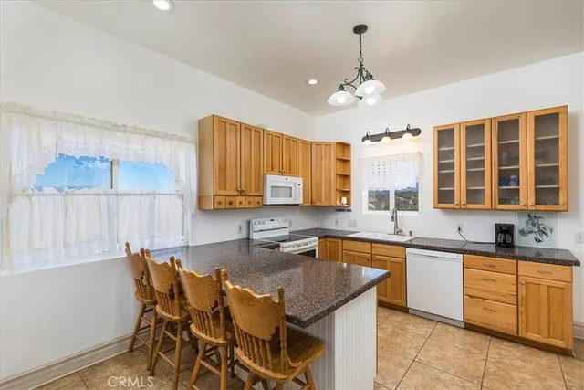 a view of house with yard