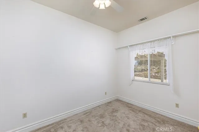 a very nice looking house with a large window