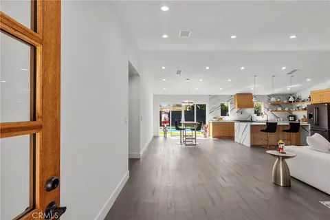 a room with furniture and a wooden floor