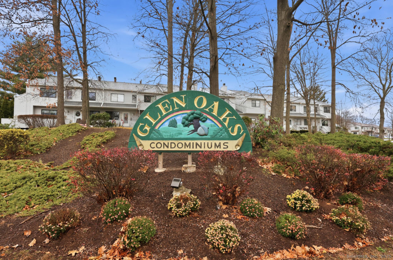 39 Cottonwood Road, Unit 39 Newington, CT 06111 - Photo 21 of 21 a sign on the side of the road