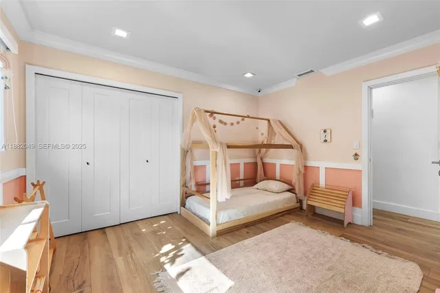 a bedroom with furniture and white walls