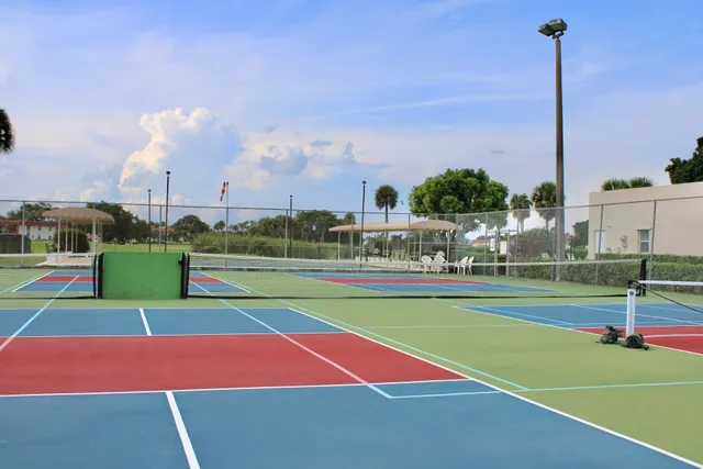 a front view of a building with garden