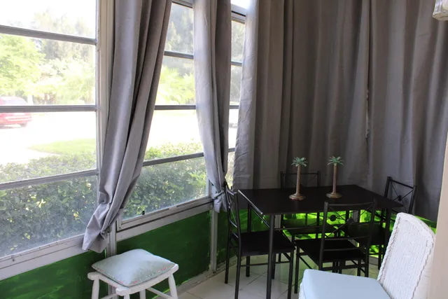 a view from deck with patio