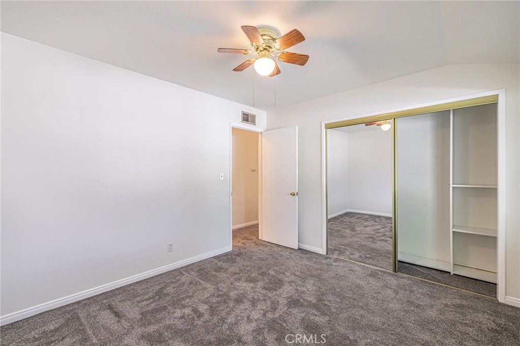 44916 18th Street West Lancaster, CA 93534 - Photo 22 of 32 an empty room with closet and fan
