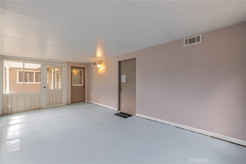 44916 18th Street West Lancaster, CA 93534 - Photo 27 of 32 an empty room with windows