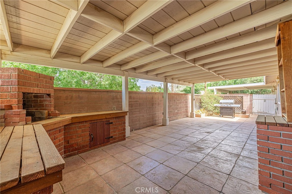 44916 18th Street West Lancaster, CA 93534 - Photo 8 of 32 a view of a backyard with sitting area