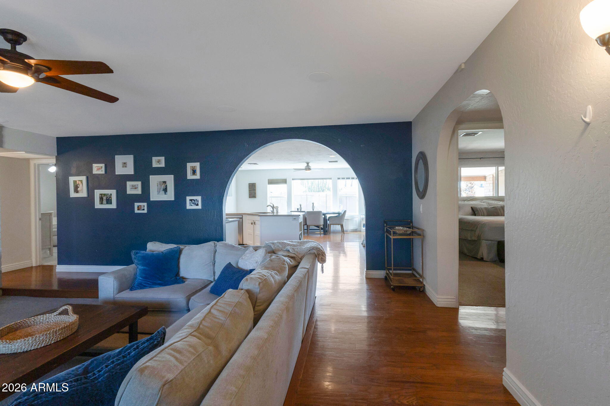 4546 North 34th Place Phoenix, AZ 85018 - Photo 12 of 29 a living room with furniture and a wooden floor