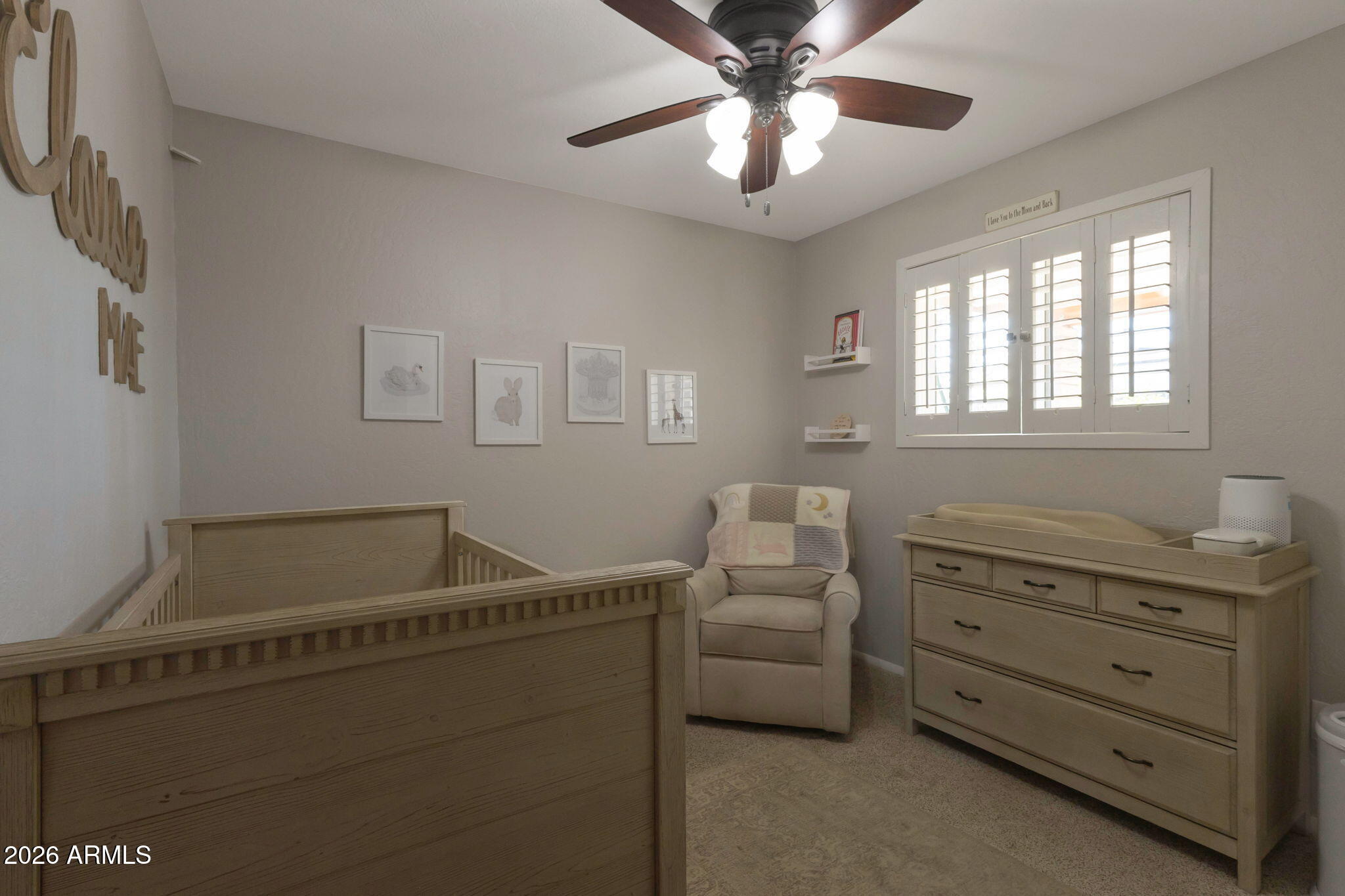 4546 North 34th Place Phoenix, AZ 85018 - Photo 19 of 29 a room with cabinets and couch