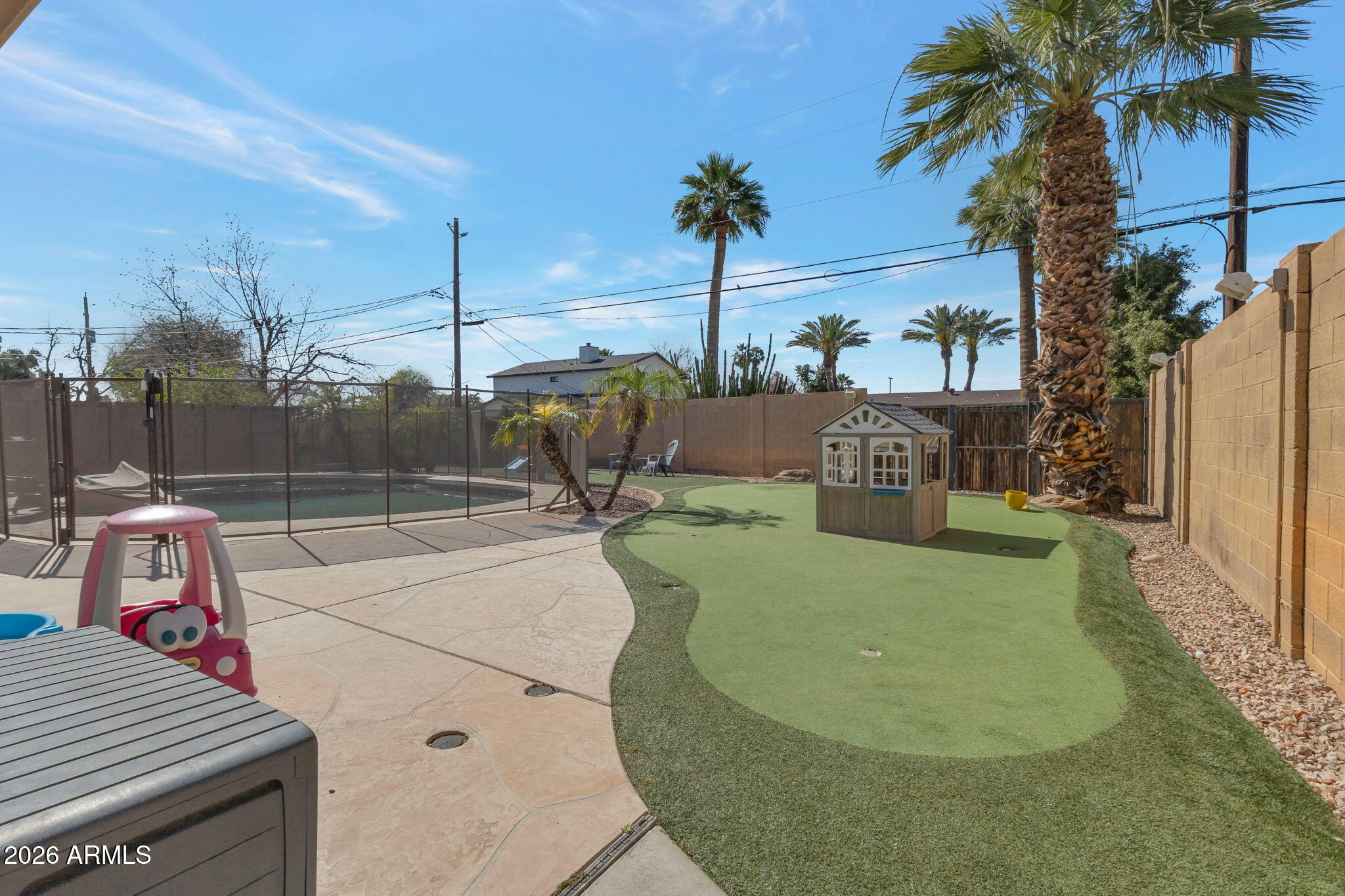 4546 North 34th Place Phoenix, AZ 85018 - Photo 24 of 29 a view of a backyard with a fountain