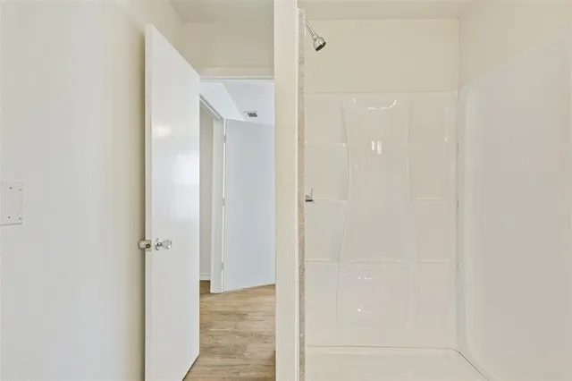 a view of a bathroom with a shower