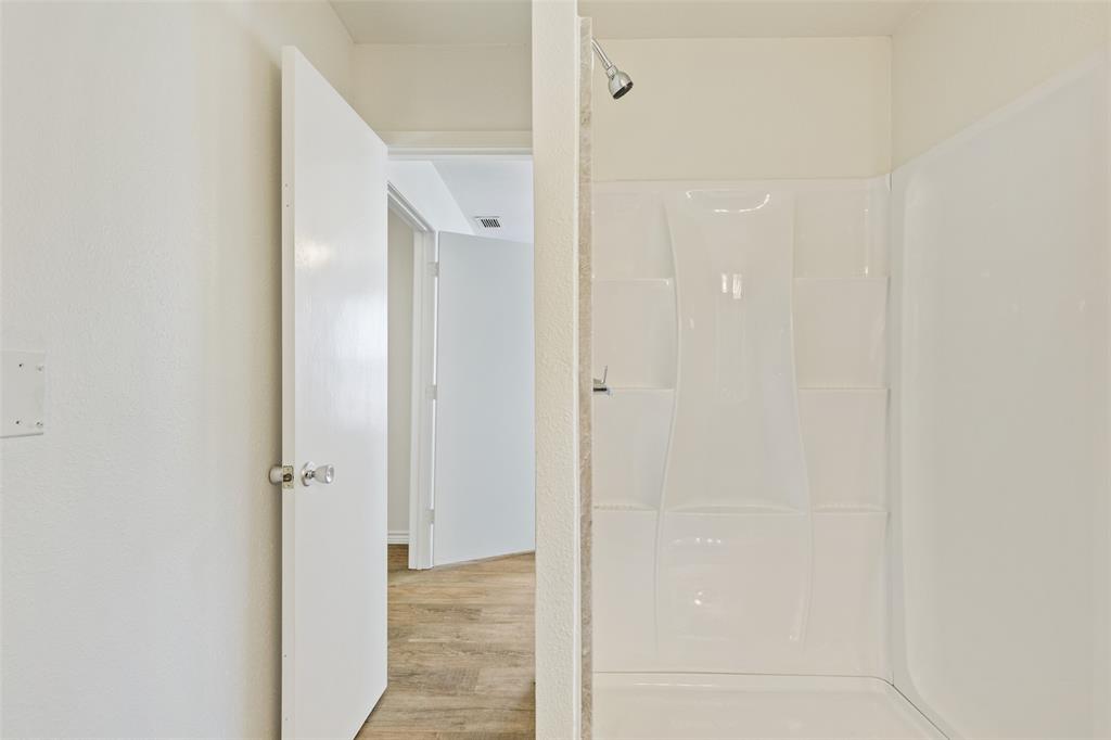 420 South Riggins Street Anna, TX 75409 - Photo 15 of 25 a view of a bathroom with a shower