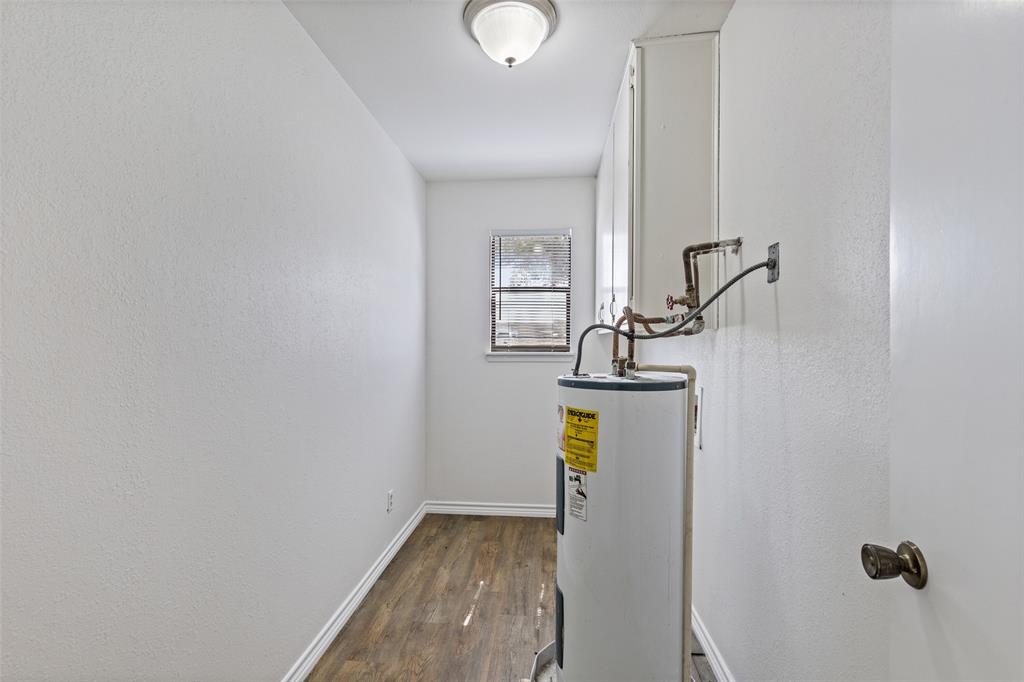 420 South Riggins Street Anna, TX 75409 - Photo 20 of 25 a bathroom with a sink