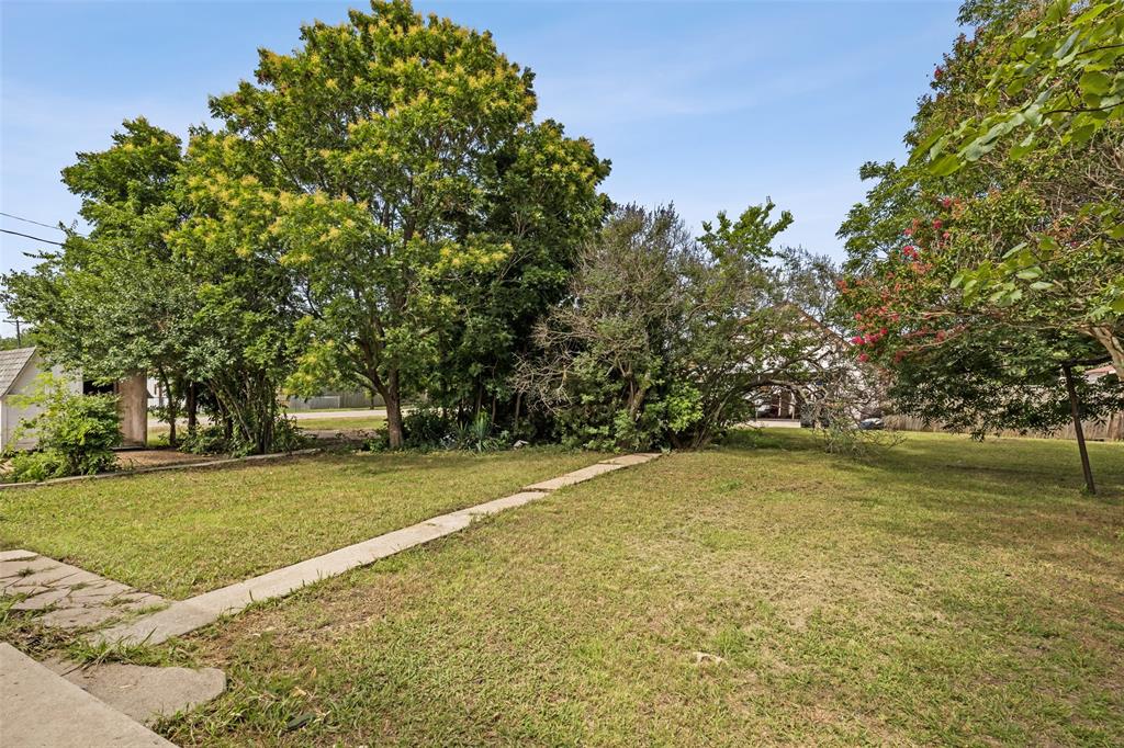 420 South Riggins Street Anna, TX 75409 - Photo 24 of 25 a view of a trees in a yard