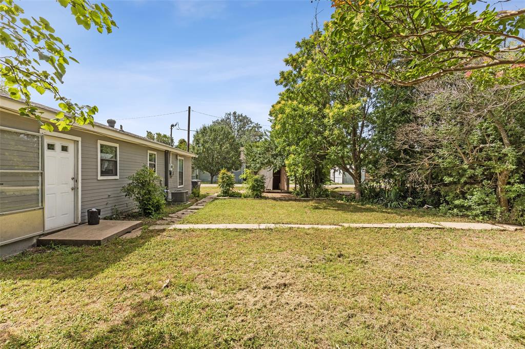 420 South Riggins Street Anna, TX 75409 - Photo 25 of 25 a view of a house with a yard