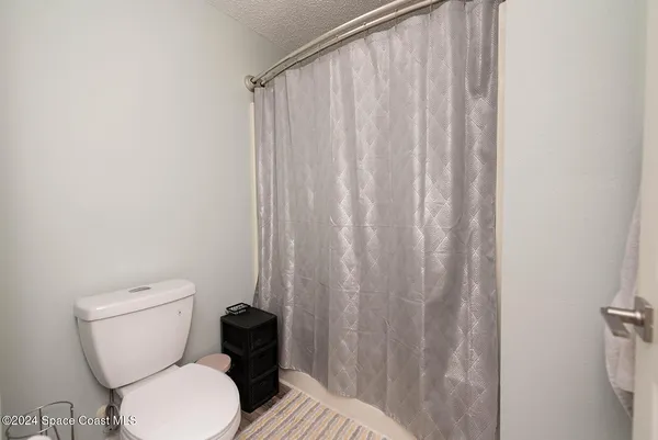 a bathroom with a double vanity sink and mirror