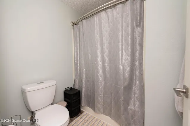 a bathroom with a double vanity sink and mirror