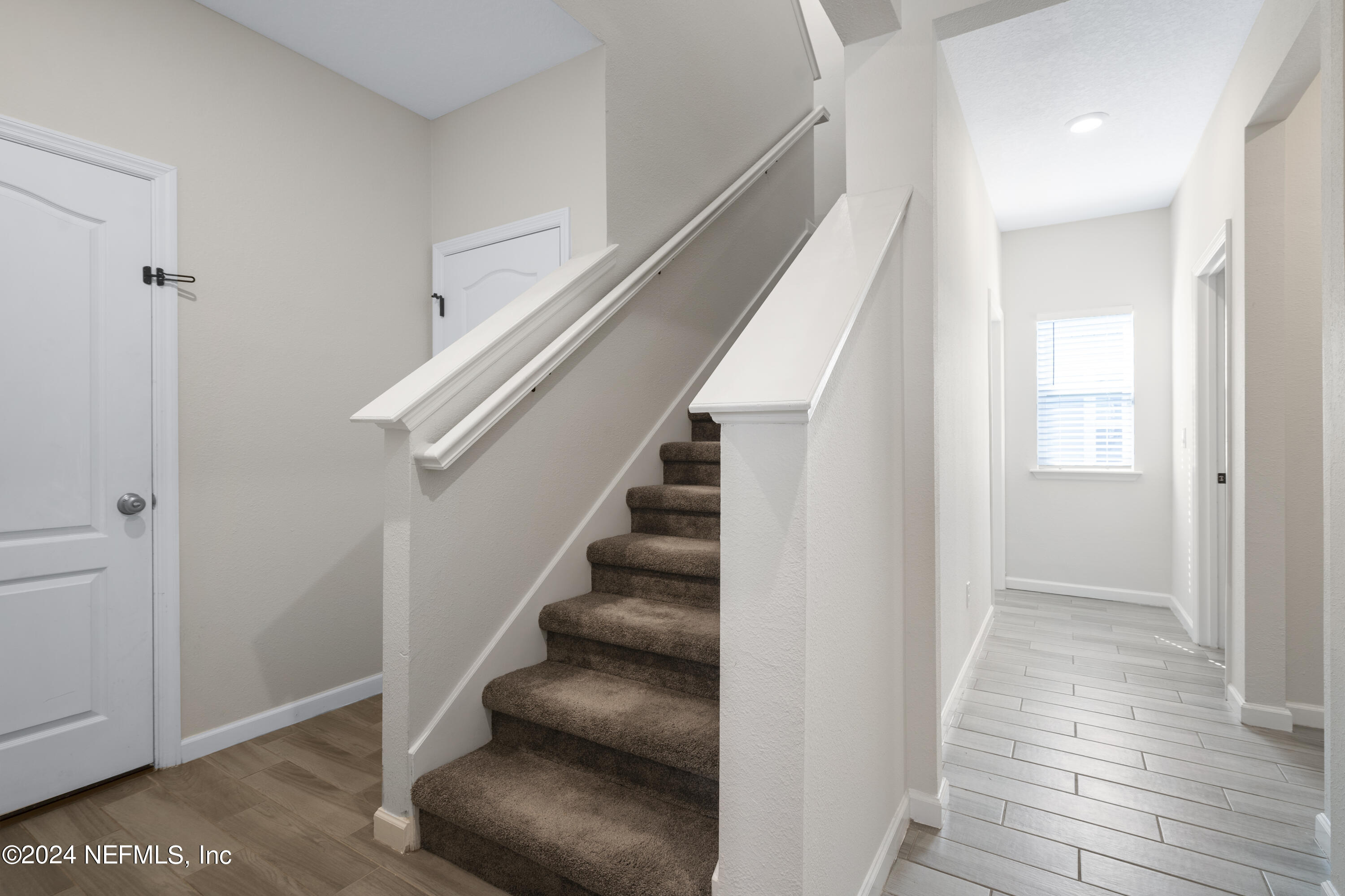 4060 Arbor Mill Circle Orange Park, FL 32065 - Photo 30 of 52 a view of entryway and hall with wooden floor