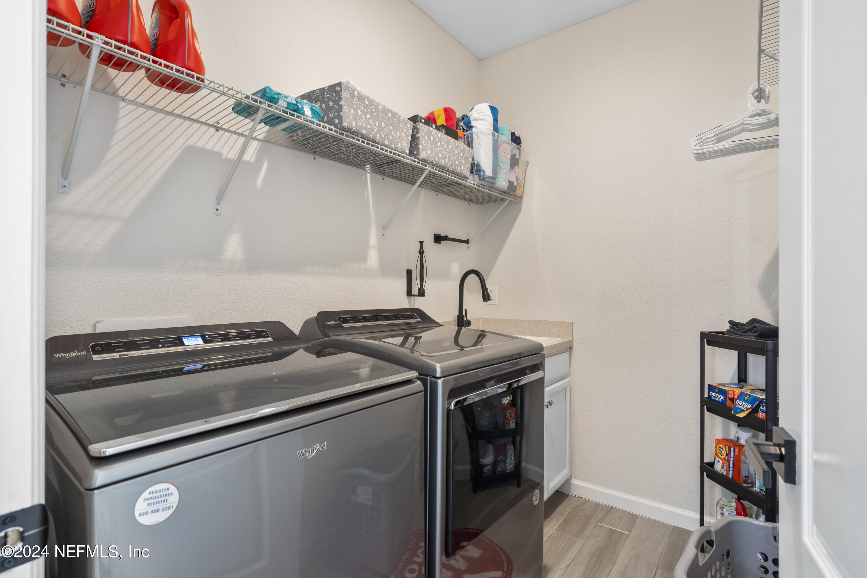 4060 Arbor Mill Circle Orange Park, FL 32065 - Photo 38 of 52 Laundry Room with Sink & Shelving