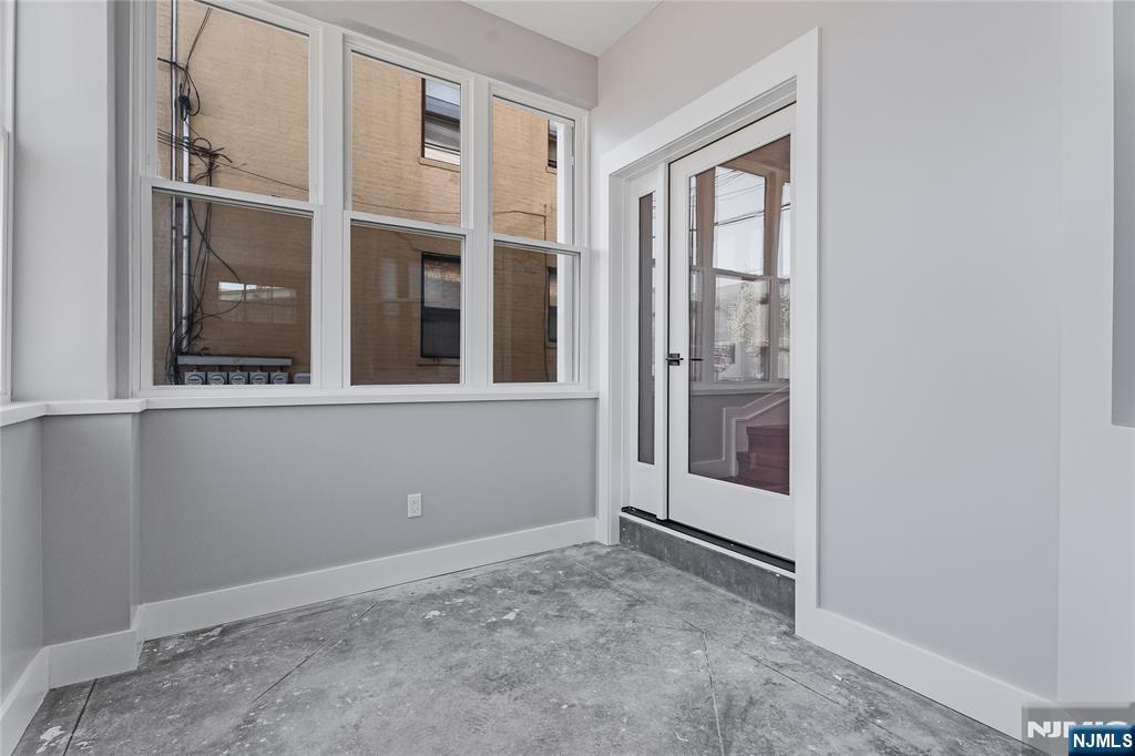 191 Franklin Street Secaucus, NJ 07094 - Photo 2 of 34 an empty room with windows