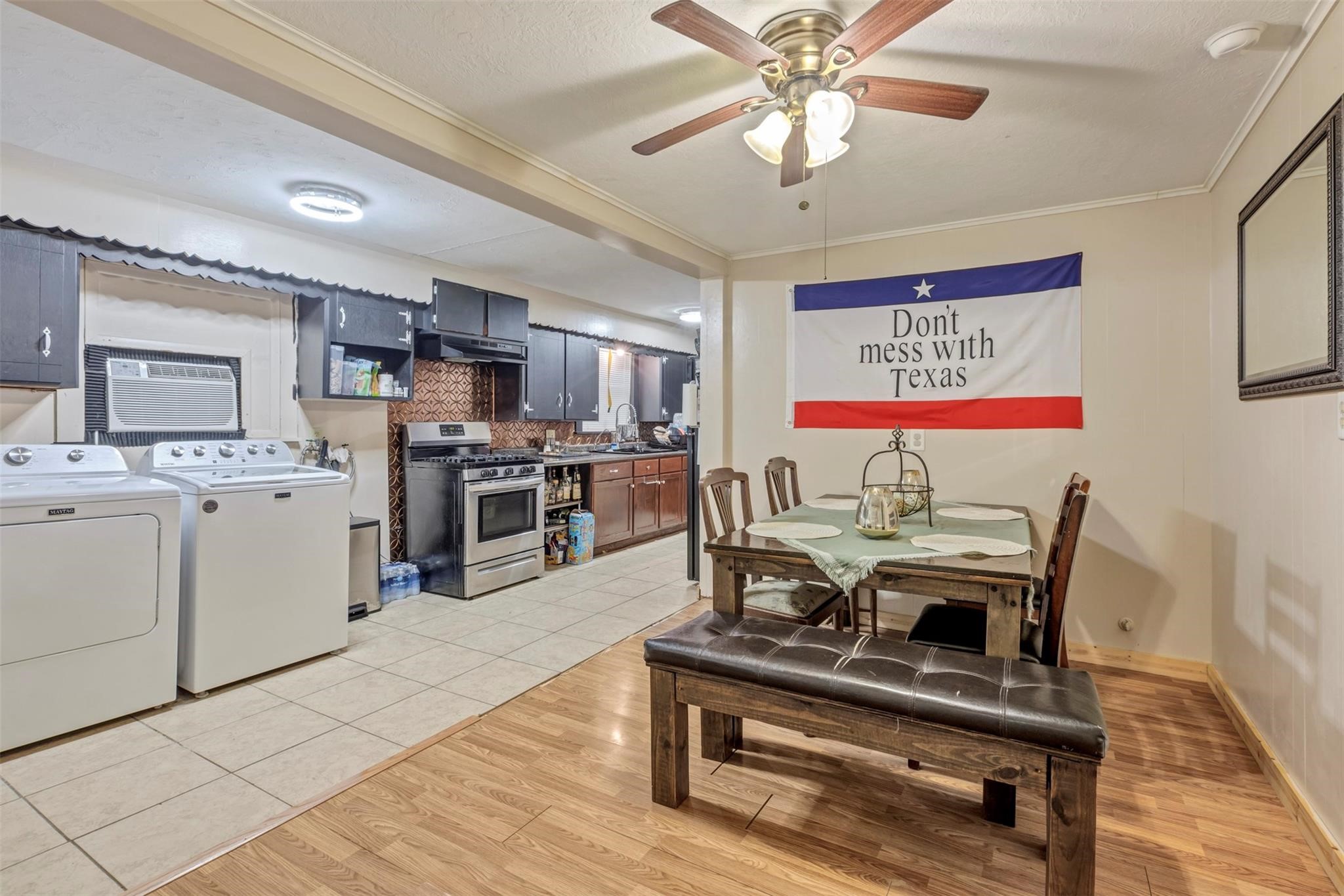 808 Morrell Street Baytown, TX 77520 - Photo 22 of 25 a living room with stainless steel appliances furniture and a kitchen view